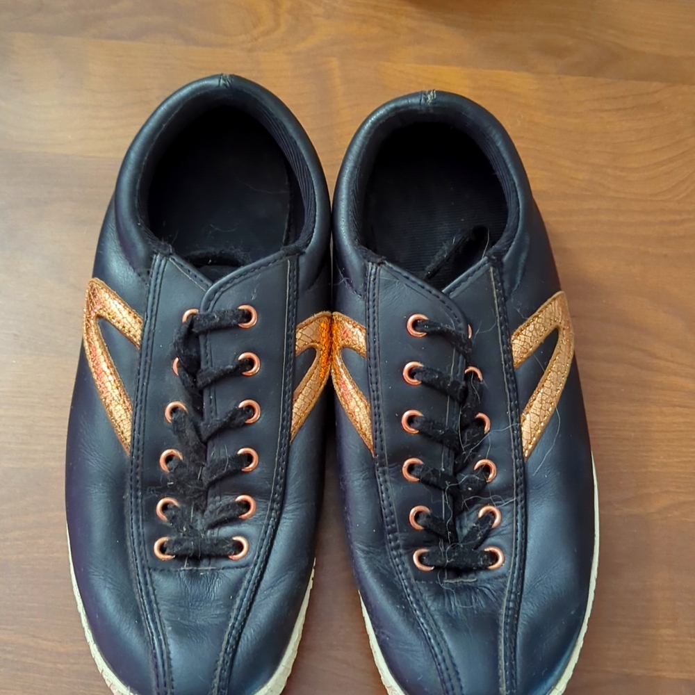 Leather tretorns with bronze edging